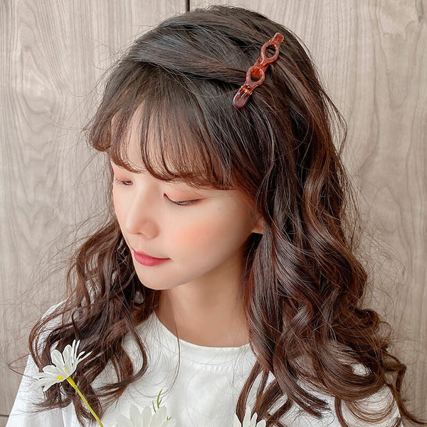 Double bangs hairstyle hairpin
